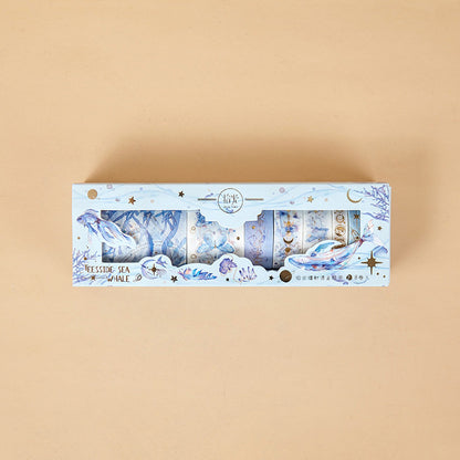 Anime Washi Tape Set - 8 Rolls for Crafting in blue tones with aquatic-themed designs and illustrations of whales, seashells, and stars.