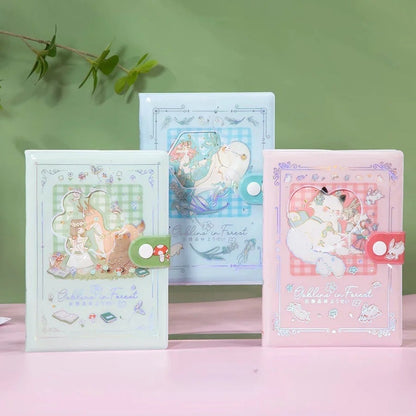 Gollina Forest Notebook - Magnetic Buckle Kawaii Journal in green, blue, and pink covers with whimsical forest animal illustrations and nature-themed designs, featuring magnetic buckle closures, displayed on a pastel background.