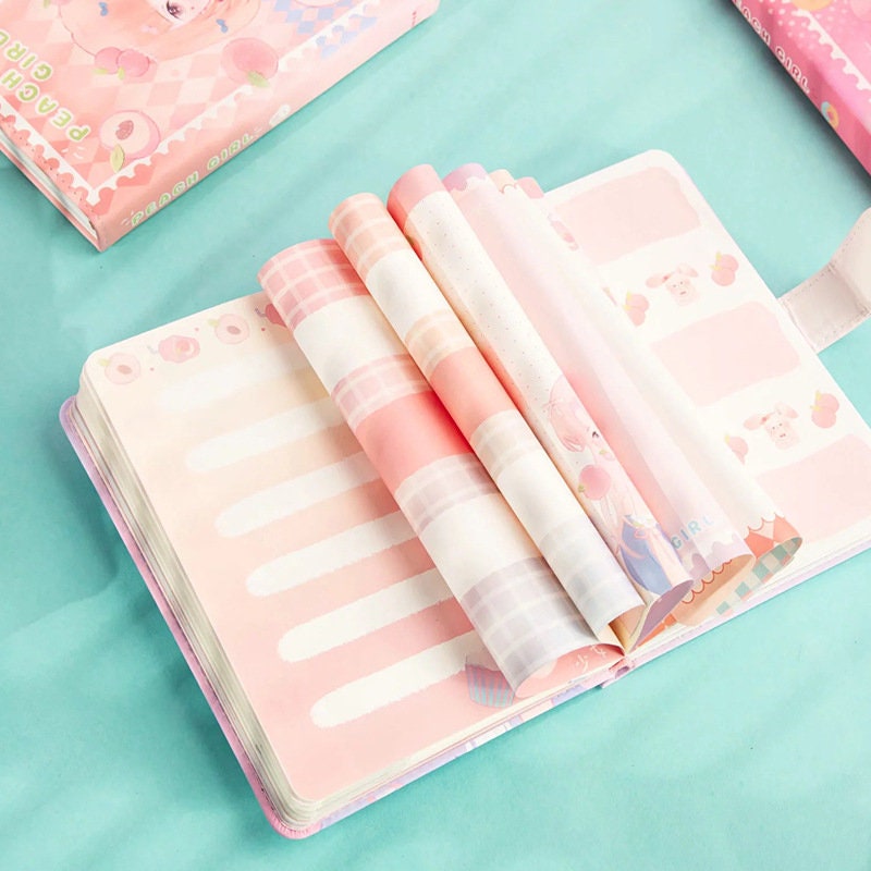 Kawaii Peach Girl Magnetic Journal with pastel pink and peach-themed pages featuring cute designs and patterns, perfect for note-taking and journaling.