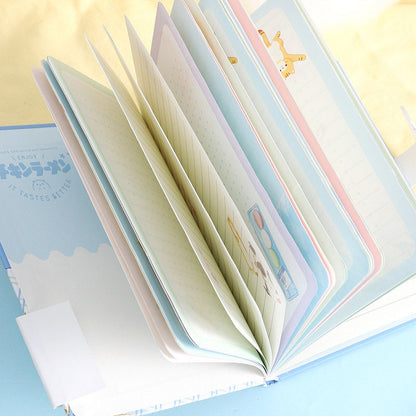 Magnetic Buckle Leather Journal with illustrated pages and "It Tastes Better" text on cover, kawaii stationery.