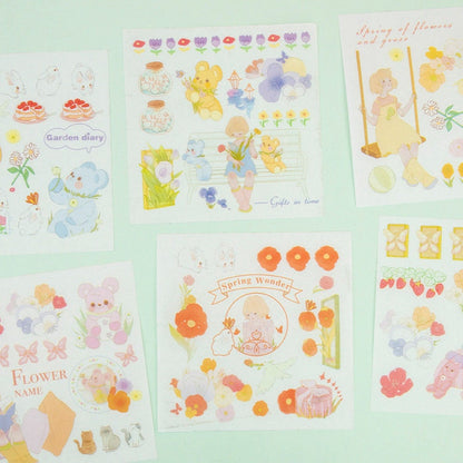 Flower Garden Notebook Gift Set with Journal and Stickers featuring adorable kawaii-themed illustrations of animals, flowers, and garden scenes in pastel colors.