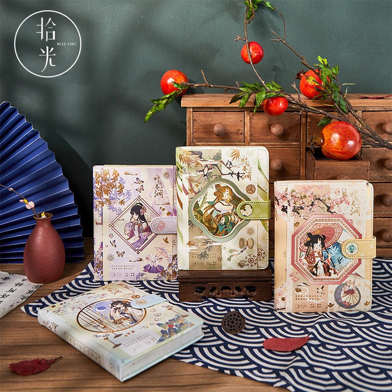 Spring Fairy Leather Journal - Anime Beauty A5, featuring kawaii artwork, displayed in a serene setting with vibrant red fruits and traditional Japanese decor. Perfect for fans of whimsical, fairy-themed stationery.