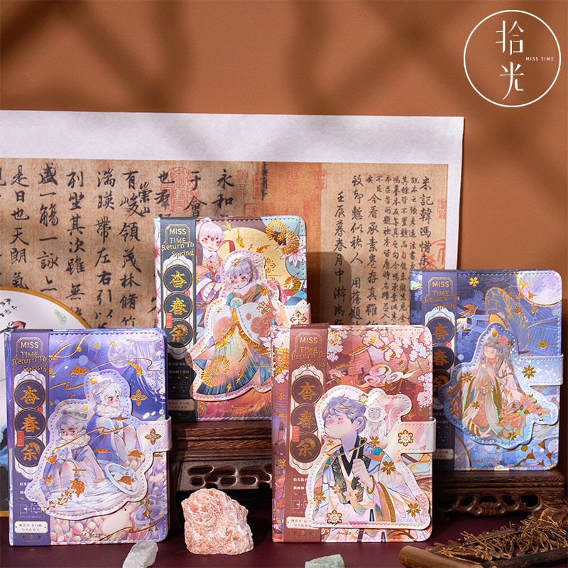 Anime Boy Leather Journal with Gold Foil Cover displayed with decorative elements, vibrant colors, and traditional patterns. Kawaii-style stationary featuring elegant anime designs, perfect for writing or drawing.