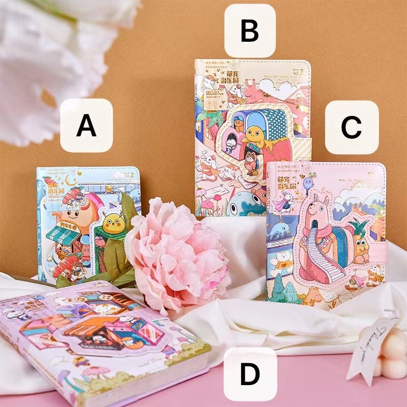 Magnetic Buckle Animal Park Leather Notebooks in various designs arranged on a light cloth background with a pink flower, labeled A, B, C, and D.