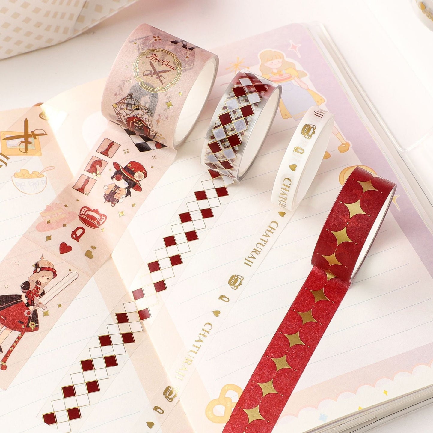 The Queen's Gambit Washi Tape Set - 5 Rolls featuring assorted decorative tapes including a chess-themed design with characters, red and gold diamond patterns, and metallic gold stars, perfect for planners, scrapbooking, and crafting.