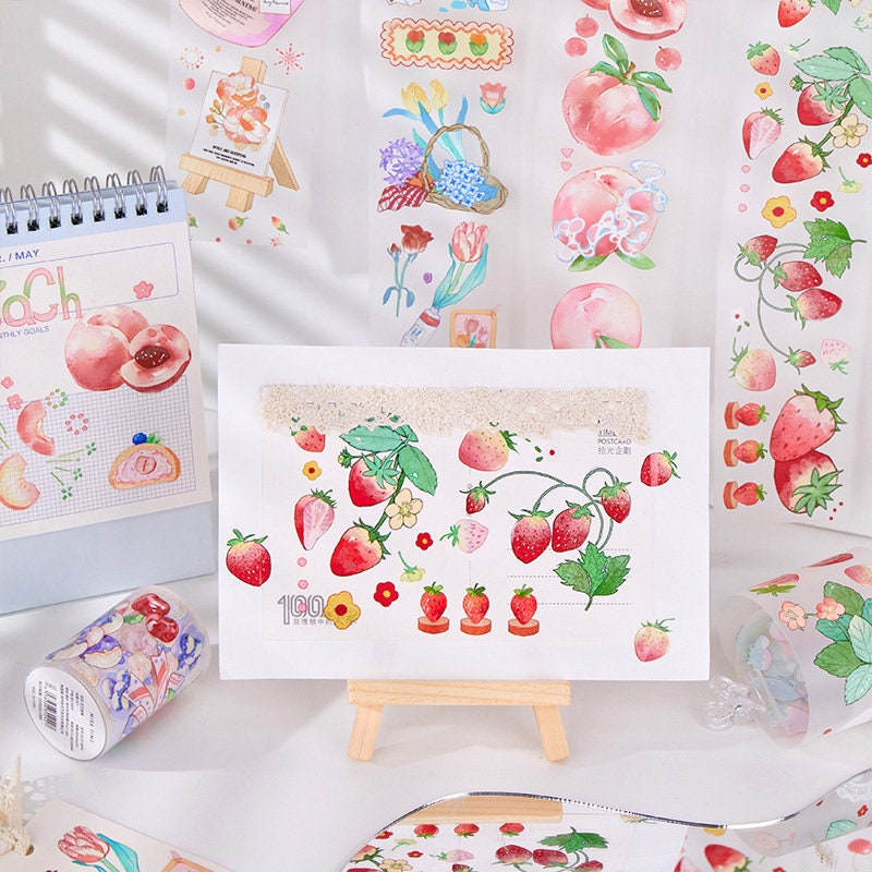 Kawaii Fruits Matte Washi Tape displayed with strawberry and peach designs, perfect for craft and DIY projects. Featuring vibrant, cute fruit patterns on matte finish, ideal for scrapbooking, planners, and journaling.