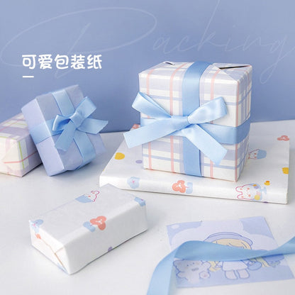 Kawaii pastel gift wrapping paper with cute designs, featuring six sheets in various patterns.