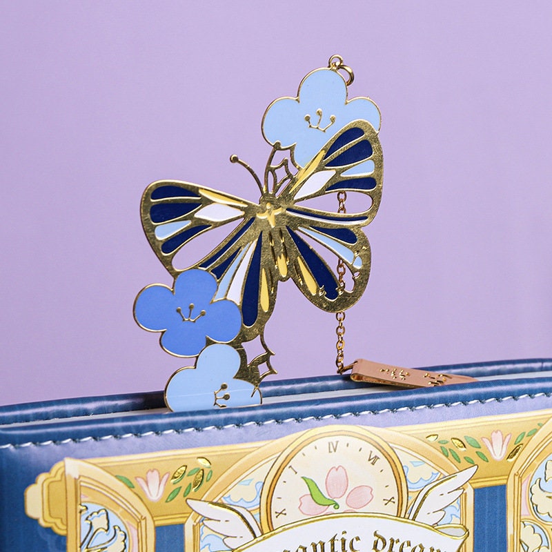 Falling Stars Decorative Sticky Notepad Set featuring a gold and blue butterfly design with blue flowers, elegant and whimsical stationary accessory.