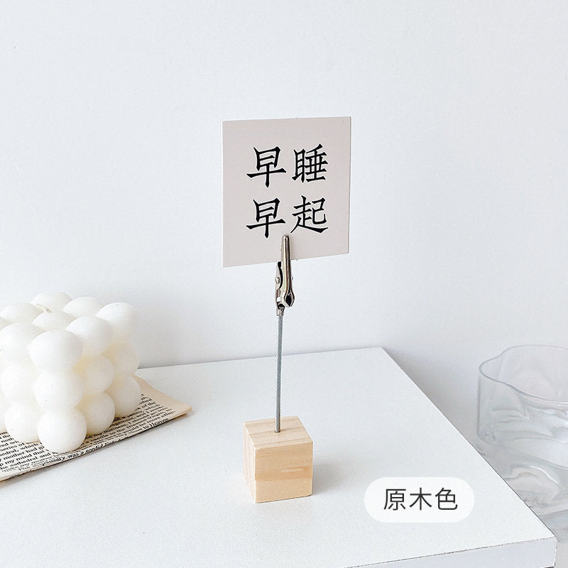 Creative Block Photo Holder with Clip, minimalist wooden block base with metal clip, perfect for holding photos, notes, and cards, stylish and functional desk accessory