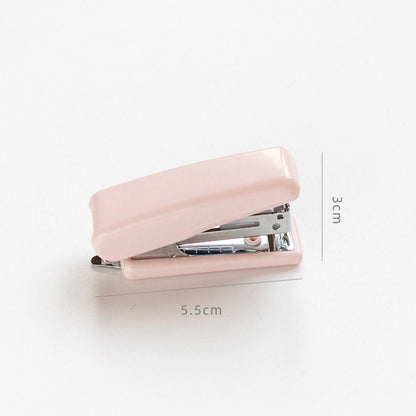 Nature-themed pink mini stapler for planners and scrapbooking, measuring 5.5cm by 3cm.