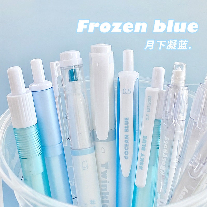 Quick Dry Gel Pen Set in Frozen Blue theme, 5-Piece, .5mm Micro Point, white barrel with blue accents, aesthetic stationery.