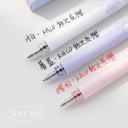 Kawaii quick-dry dual color micro pen set showing white, light purple, and pink pens with fine tips writing on white paper