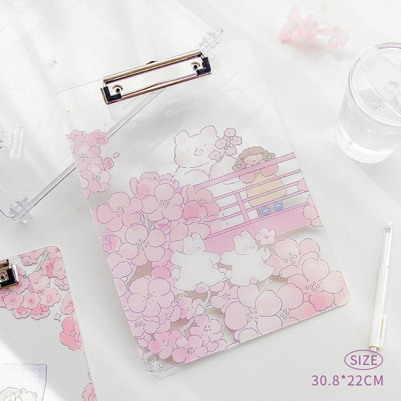 Sakura Animal Design Clipboard with pink cherry blossom artwork and cute animal illustrations, sturdy plastic, 30.8 x 22 cm.